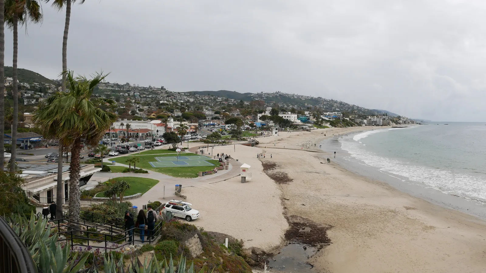 Laguna Main Beach and its lawn on a cloudy day