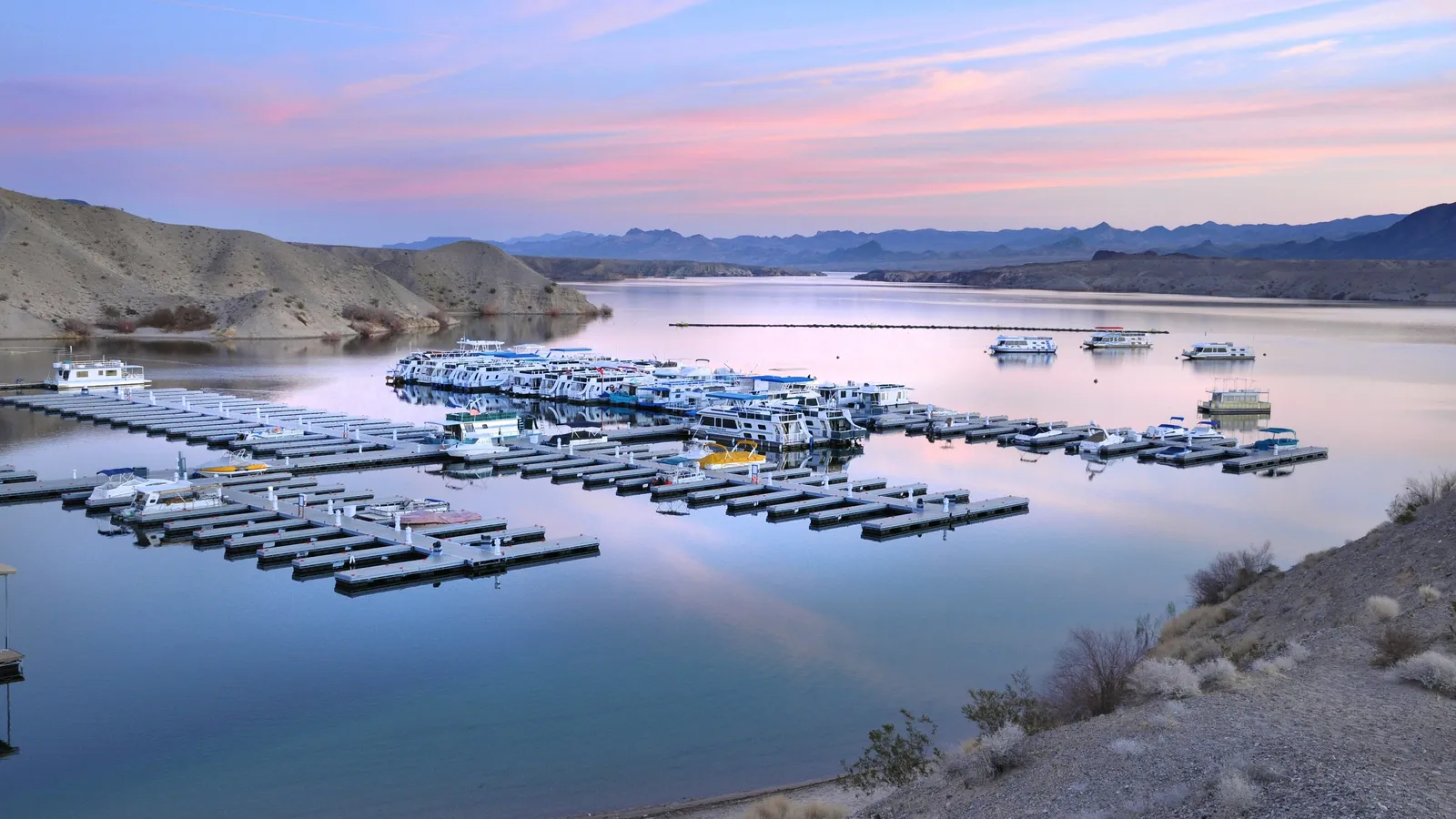 The marina at Cottonwood Cove on a calm Lake Mohave at dusk