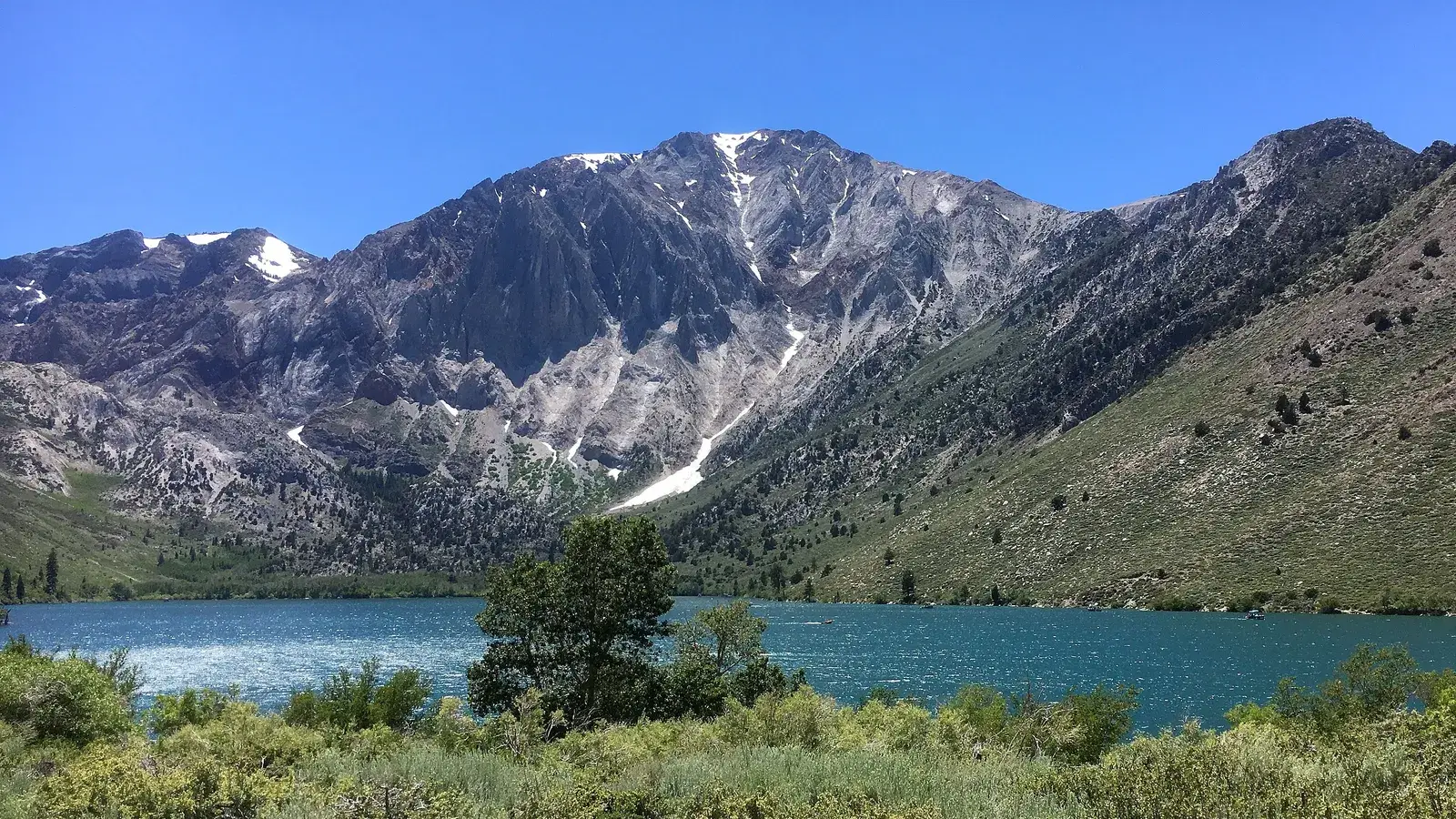 Turquoise Convict Lake below the steep slopes of Mount Morrison