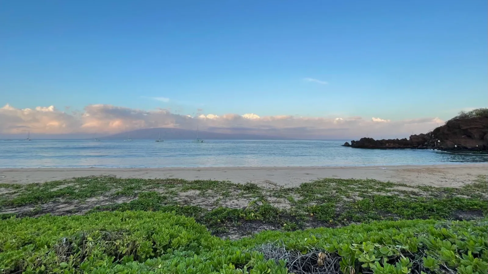 Ka'anapali Beach at sunrise, with Black Rock on the right and Lanai across the channel
