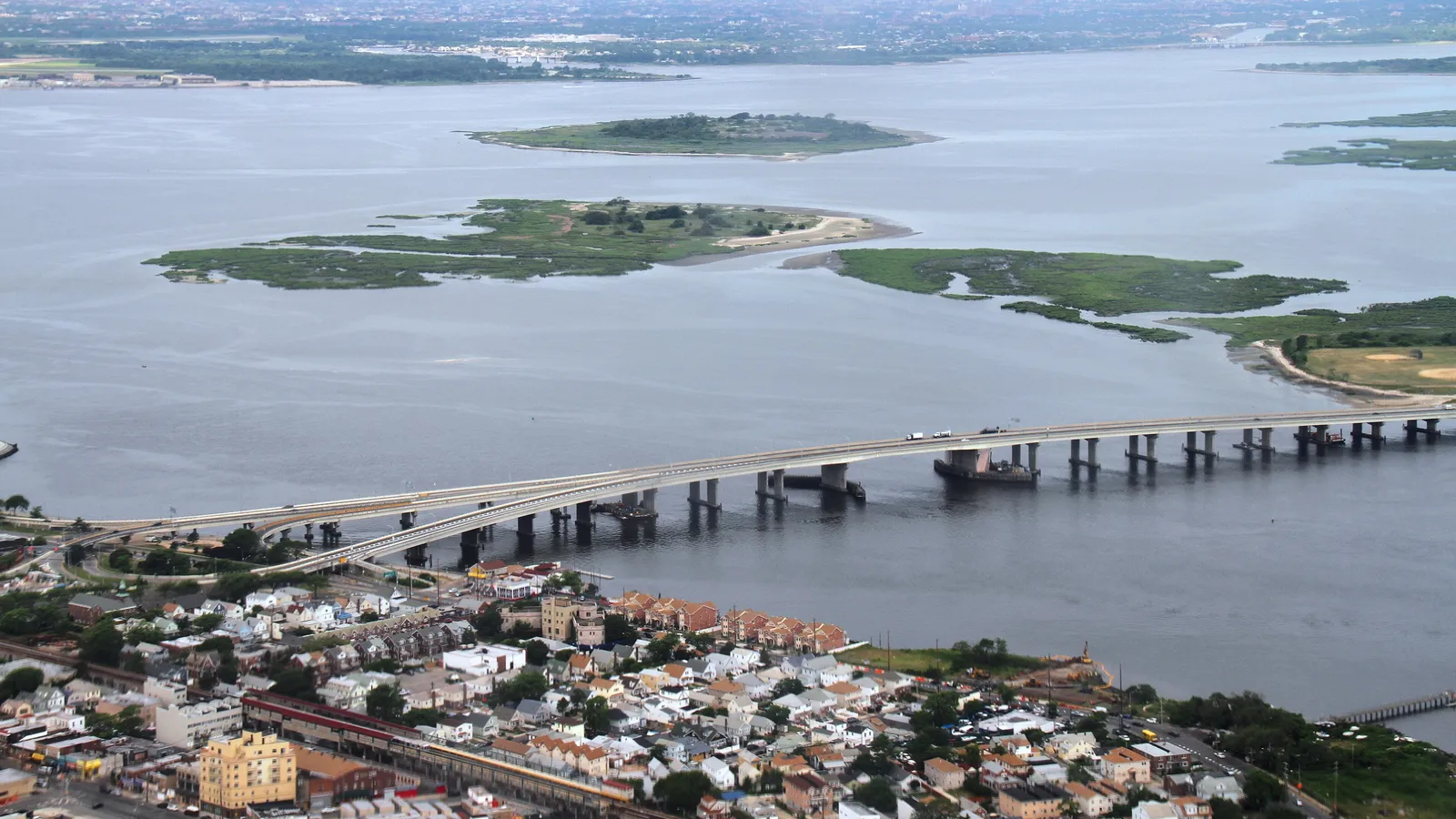 Aerial view of Jamaica Bay's marsh islands and the Cross Bay Bridge from the Rockaway peninsula