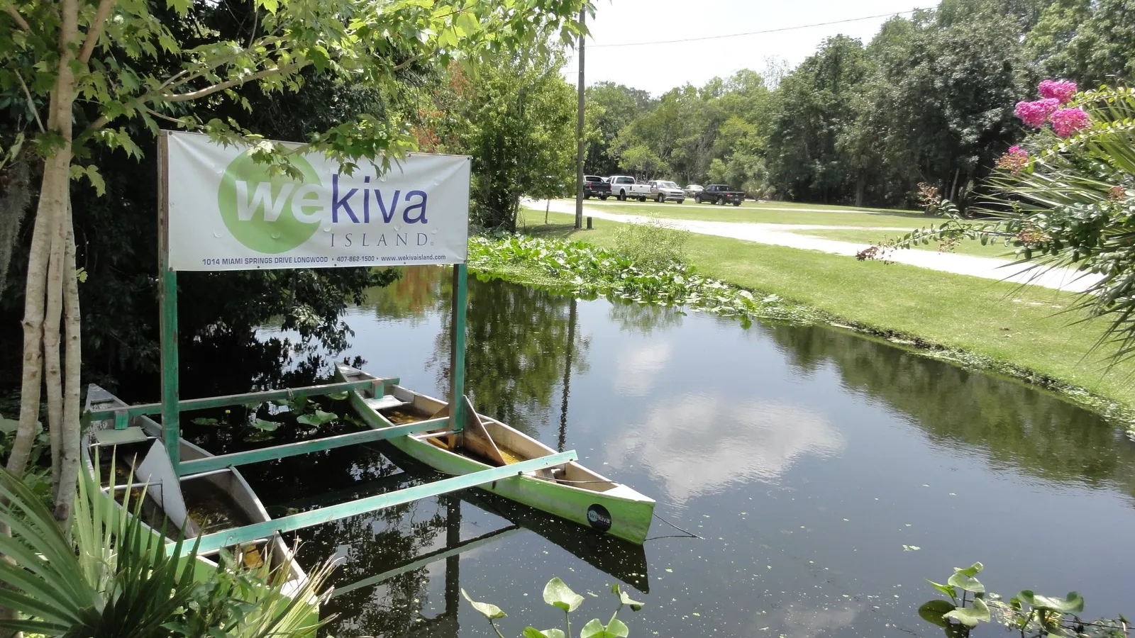 Rental canoes on a rack beside the Wekiva Island sign on the Wekiva River