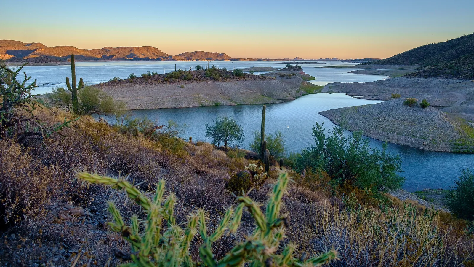 Lake Pleasant's coves and desert shoreline at sunset