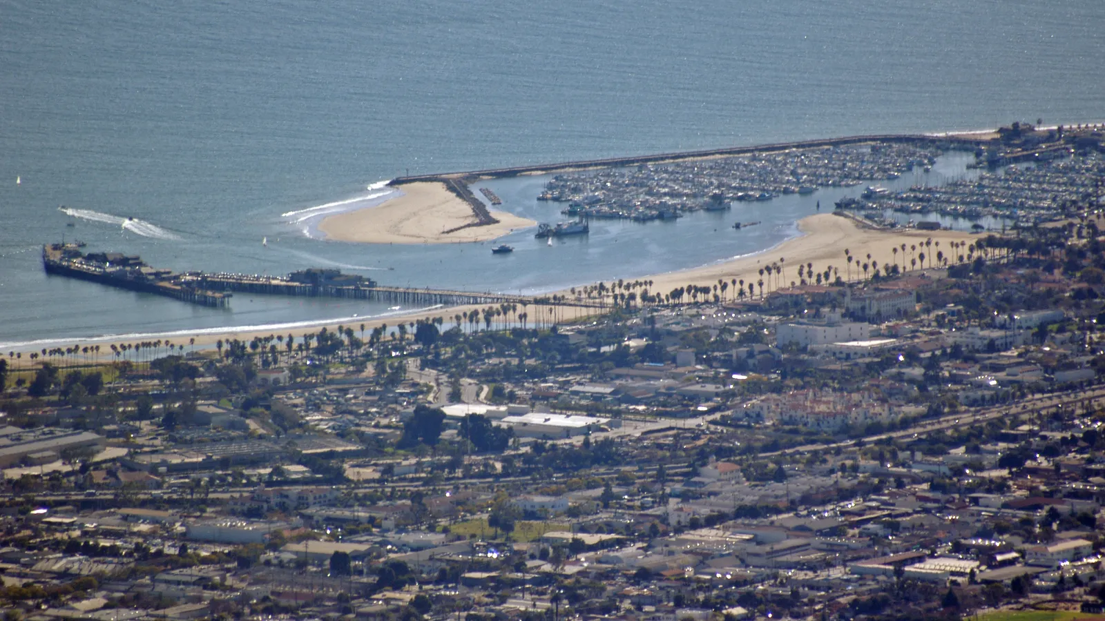 Stearns Wharf, West Beach and the harbor's sand spit seen from the hills above Santa Barbara