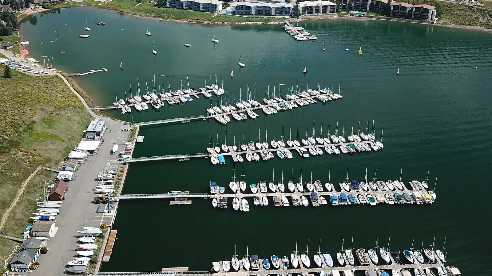Sailboats moored at a marina on Dillon Reservoir, seen from above
